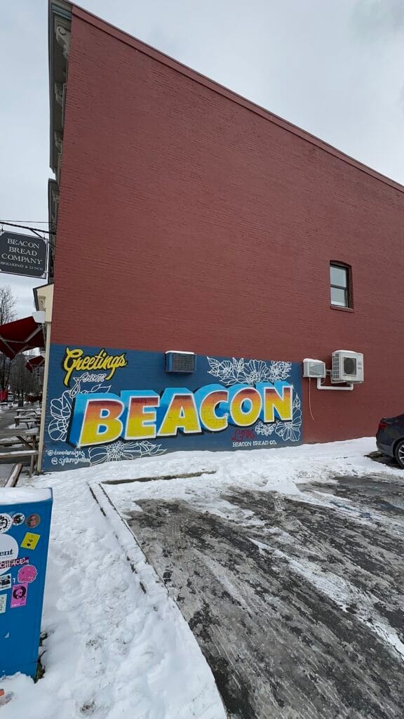 a building with a sign on the side in beacon ny