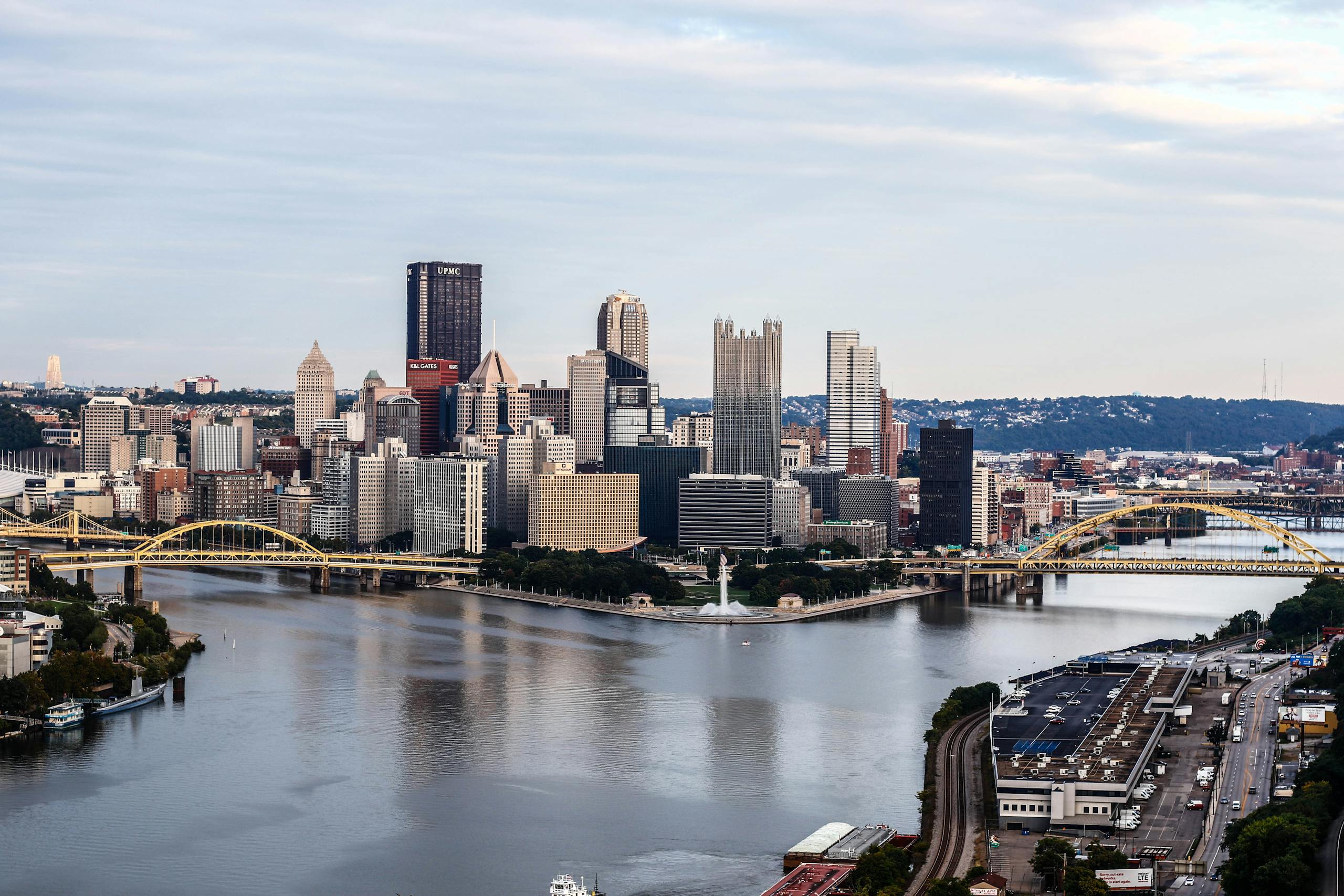 Discover the stunning Pittsburgh skyline with its iconic bridges over the Allegheny River.