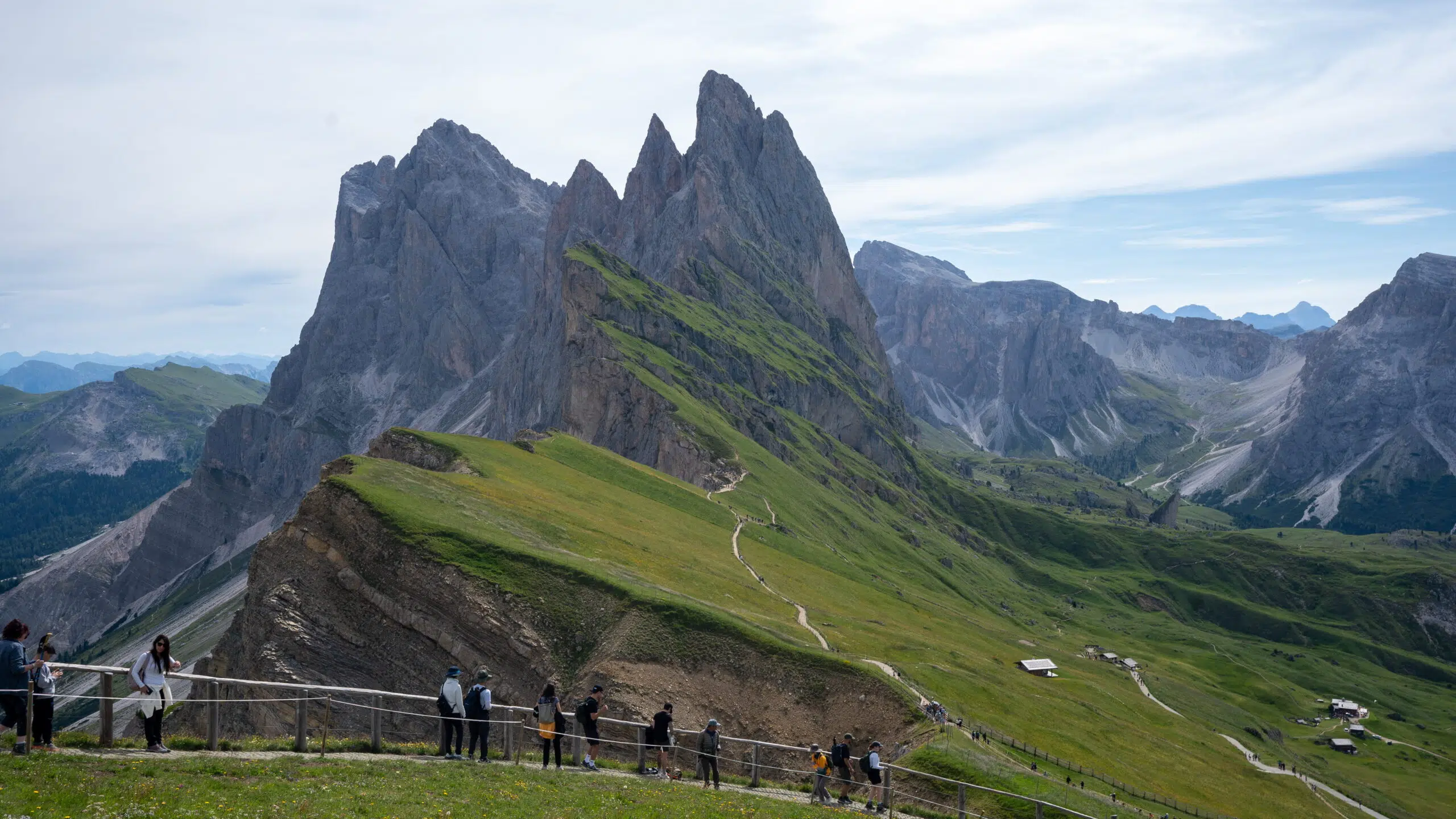 Seceda ridge overlook with hikers, Val Gardena, Dolomites