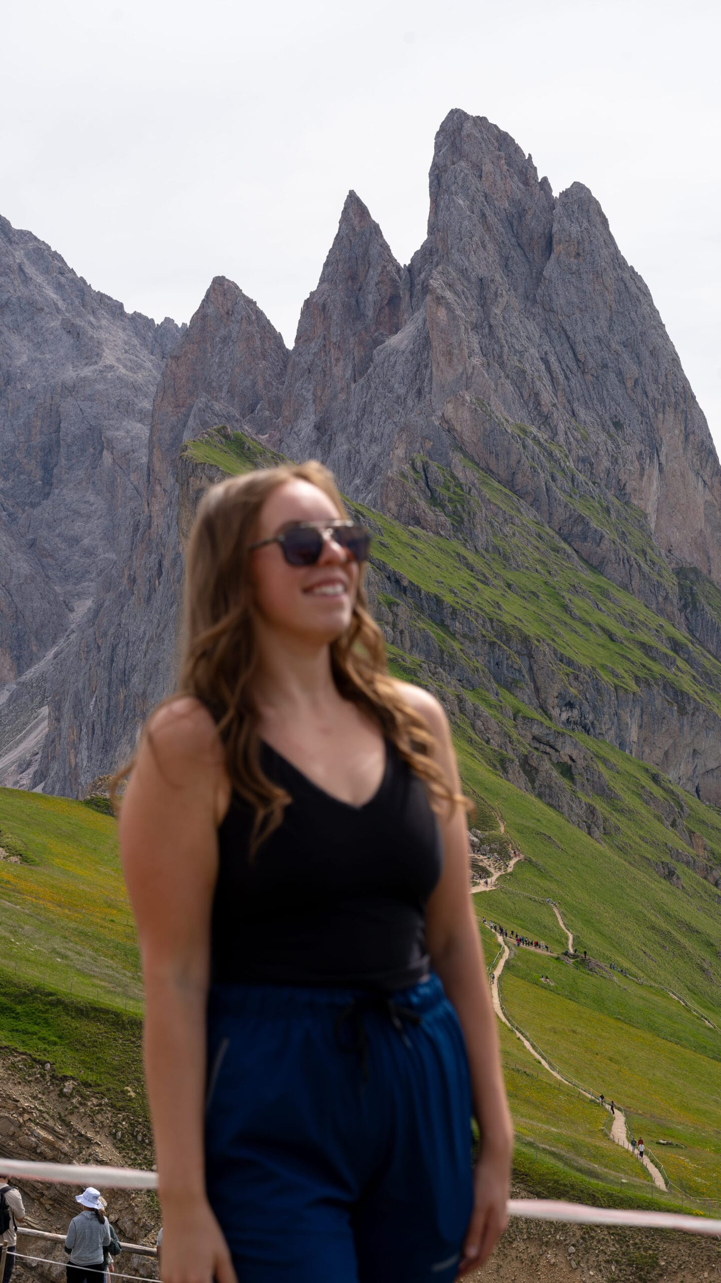 Standing at the Seceda viewpoint overlooking the Odle peaks, Val Gardena, Dolomites