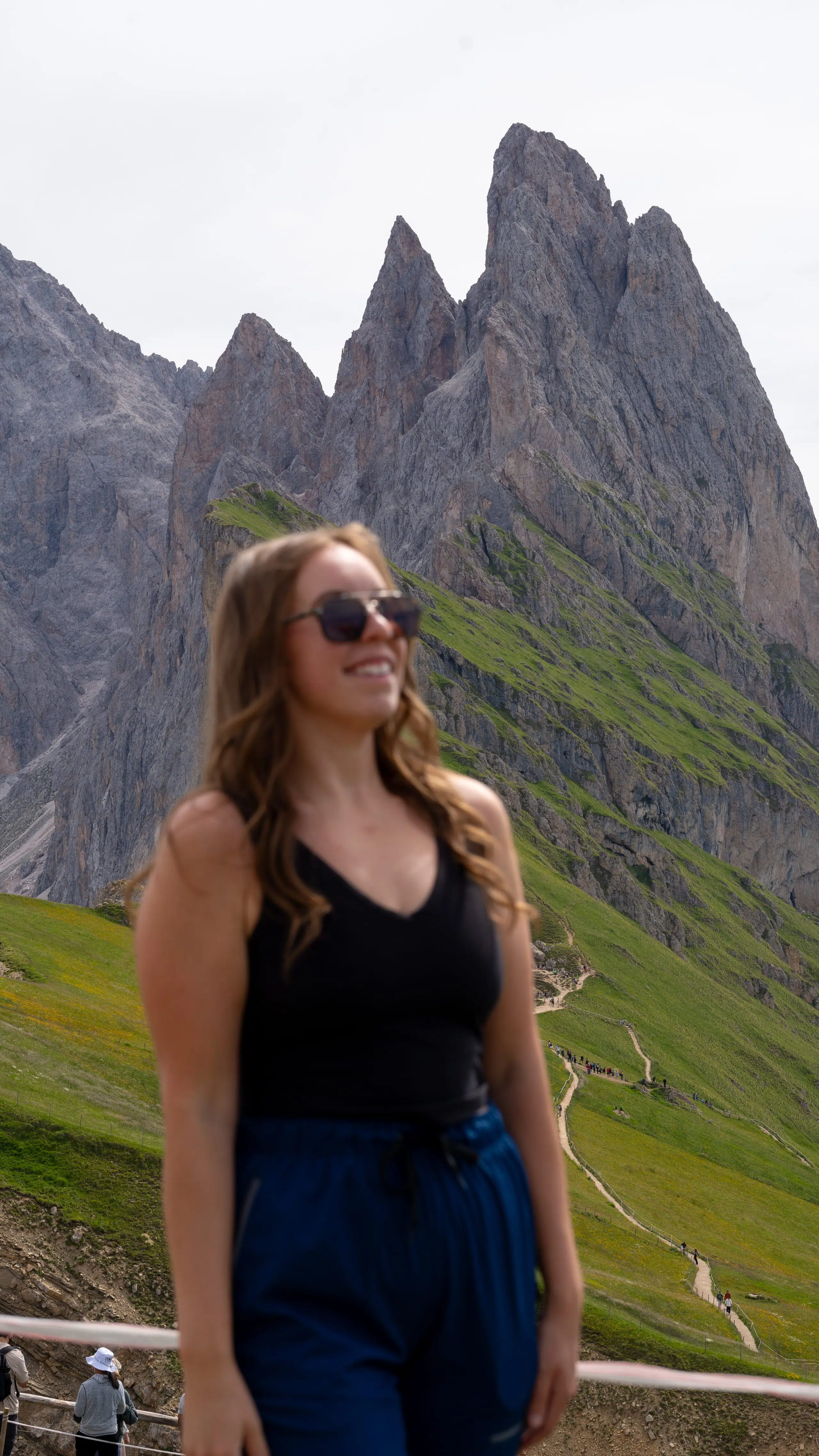 Standing at the Seceda viewpoint overlooking the Odle peaks, Val Gardena, Dolomites
