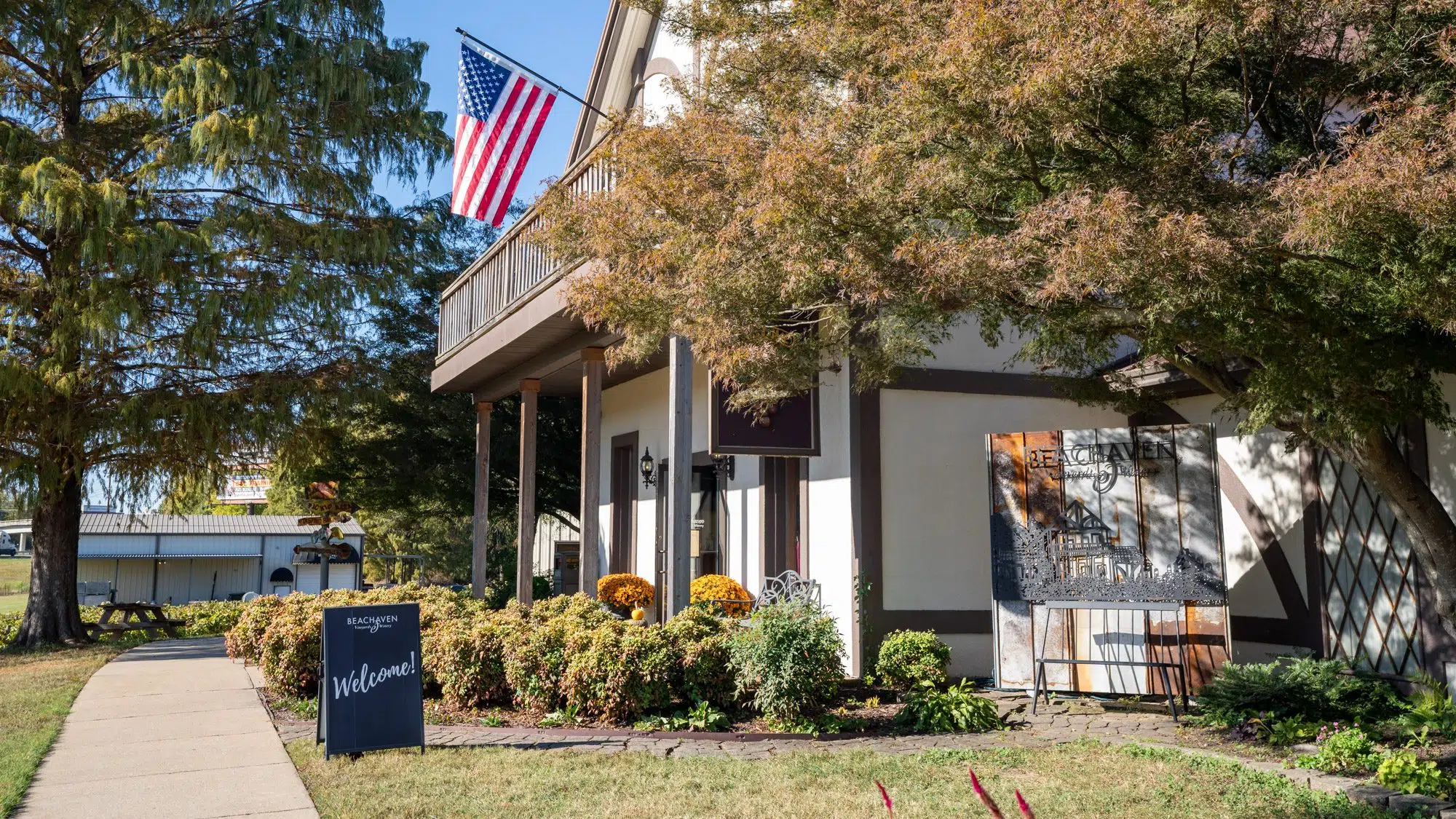 Beachaven Vineyards and Winery tasting room with fall flowers in Clarksville, Tennessee