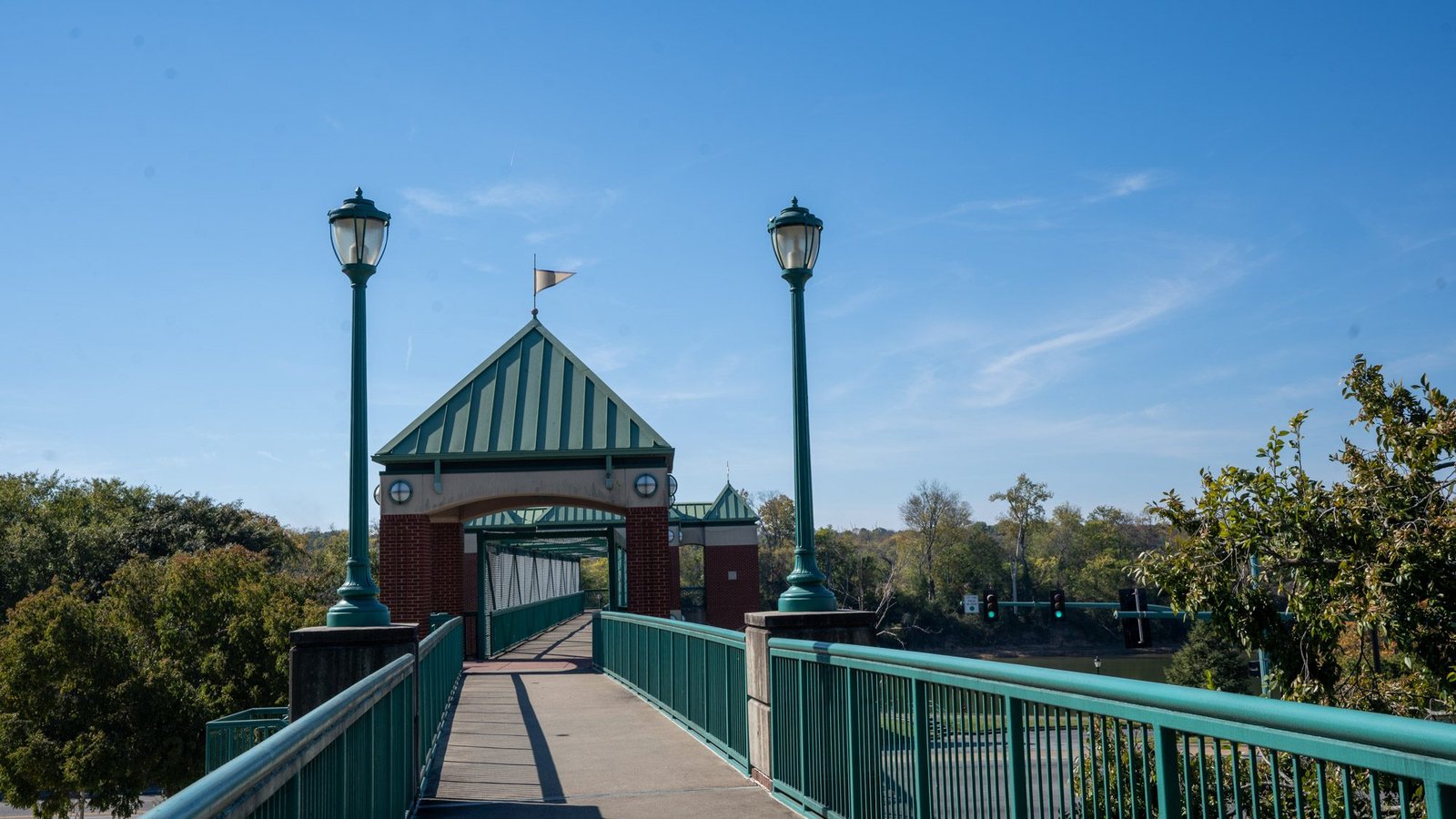 Walkway leading to a green-roofed pavilion along the Cumberland Riverwalk in Clarksville, TN during things to do in clarksville
